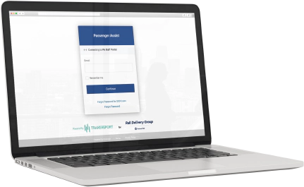 A laptop computer showing the Passenger Assistance Staff Web Platform login page.