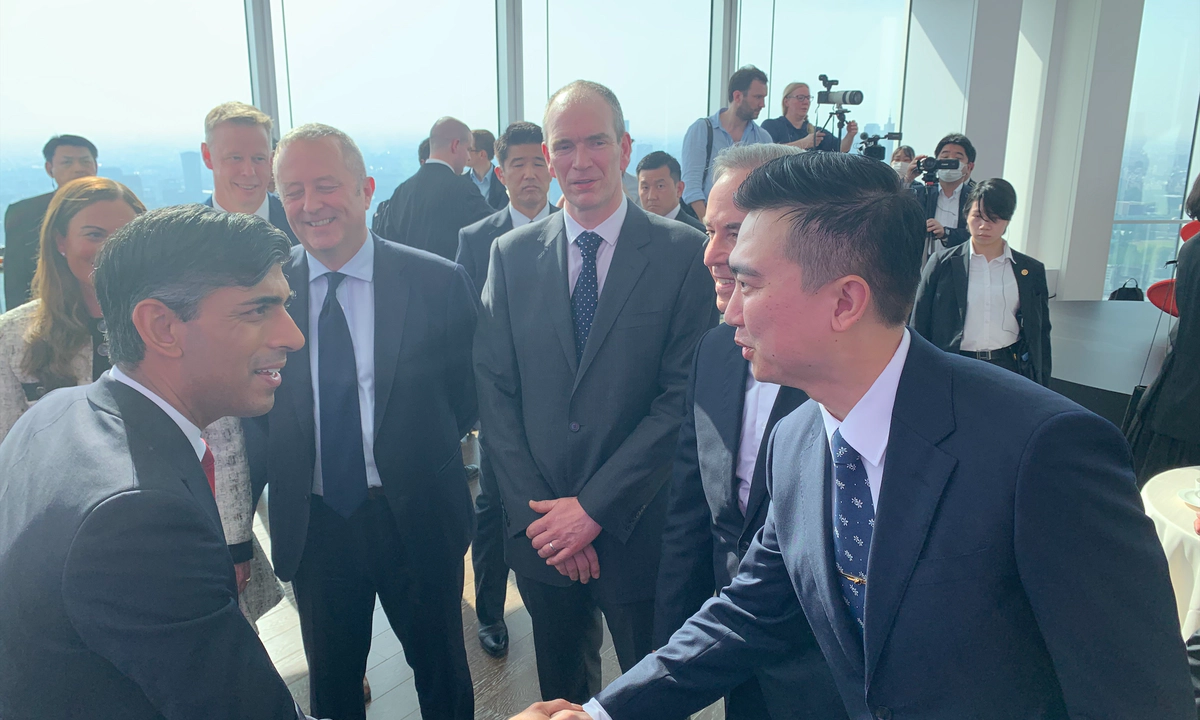 Jay Shen, CEO of Transreport, shaking hands with Rishi Sunak, Prime Minister of the United Kingdom, at the G7 2023 summit.