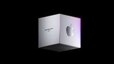 A silver 3D cube with "Apple Design Awards 2023" and an Apple logo, floating against a black background.