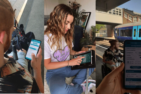 A woman in jeans and a t-shirt, sitting cross-legged, holding a computer tablet using the Passenger Assistance app.