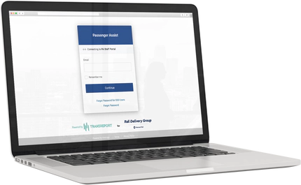 A laptop computer showing the Passenger Assistance Staff Web Platform login page.